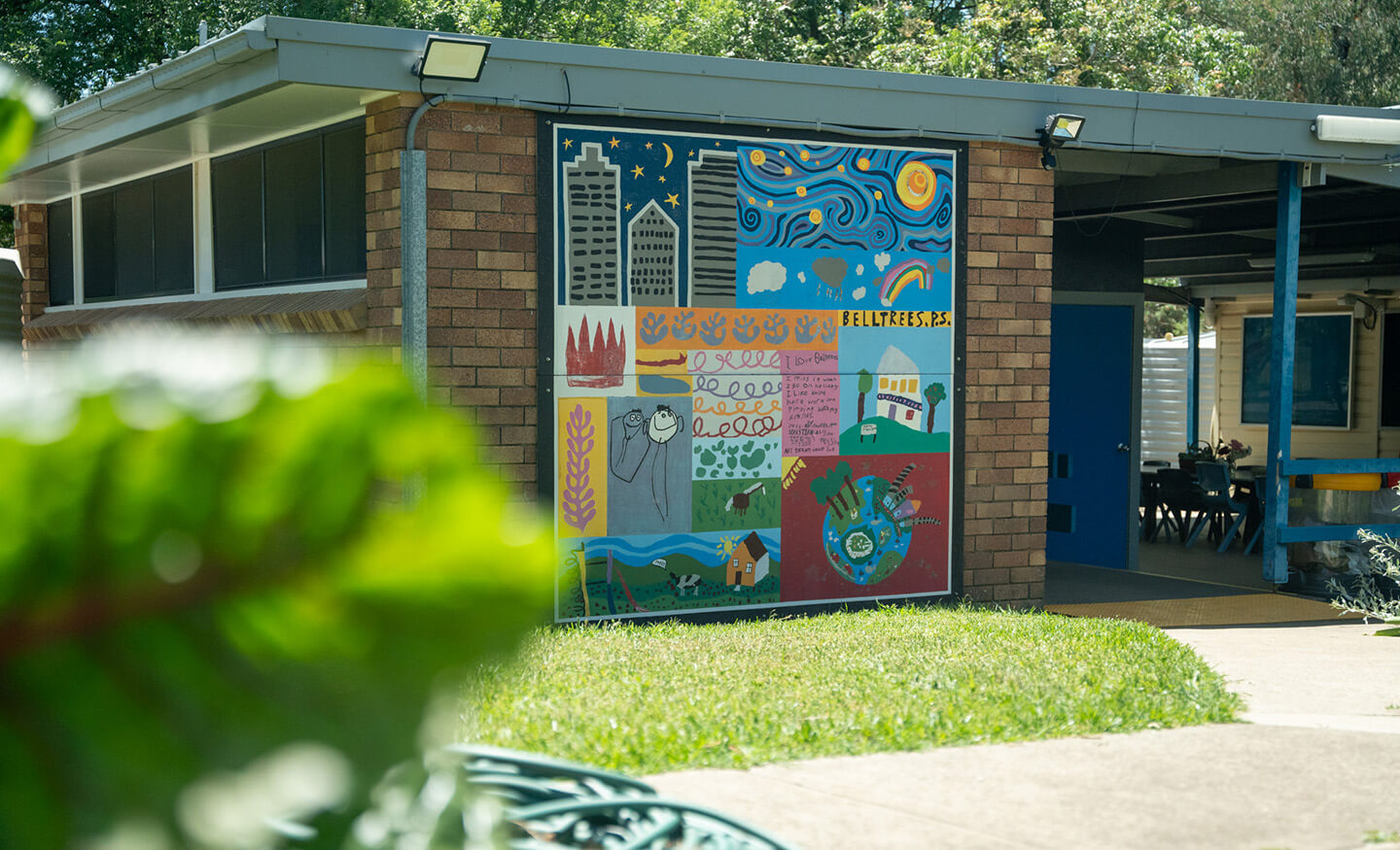 Exterior of school with mural