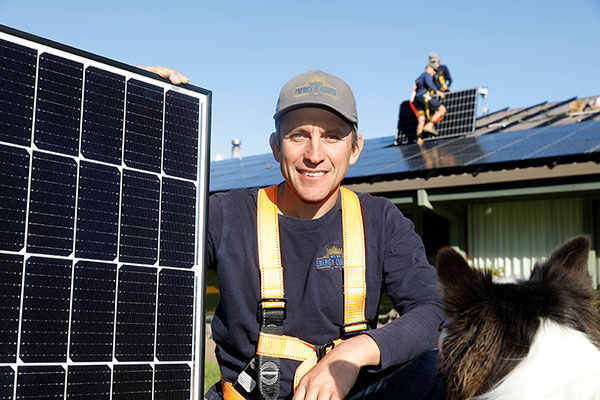 Joe Edginton of Energy Culture with a Solar Panel