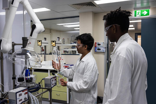 2 people in lab coats